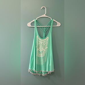 NWOT … Mint Green “Size: S” Criss Cross Tasseled Top